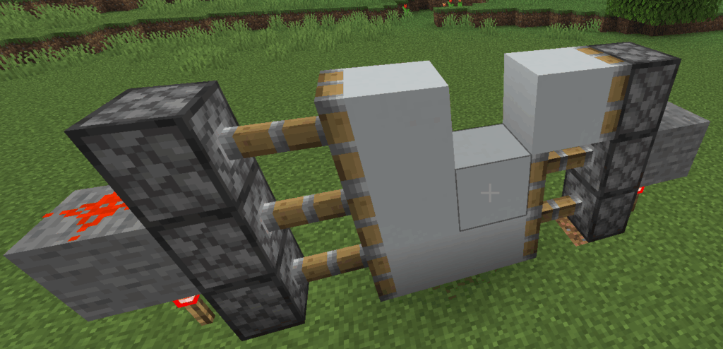 A completed 2x2 redstone piston door in its closed and powered state, viewed from the side.
