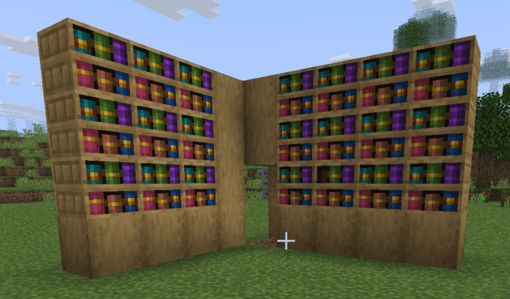 A large-scale secret entrance in Minecraft designed to look like a giant open book made of bookshelves.